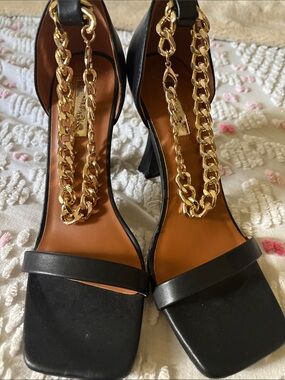 Women's Black Leather Heels with Gold Chain Accent